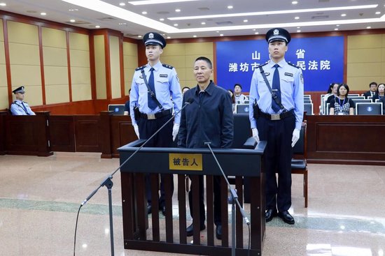 中国证券监督管理委员会原党委委员	、副主席王建军受贿案一审宣判